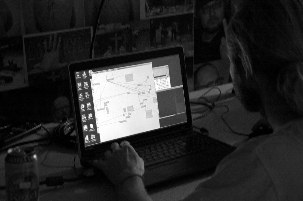 Black and white: a laptop showing the patch that drives the installation.